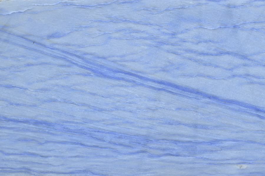 Azul Macaubus — close view of the stone surface. Vivid blue banding with white drift.